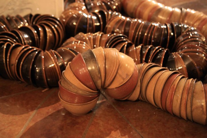 Thomas Lowell Edwards bowls nested in a line