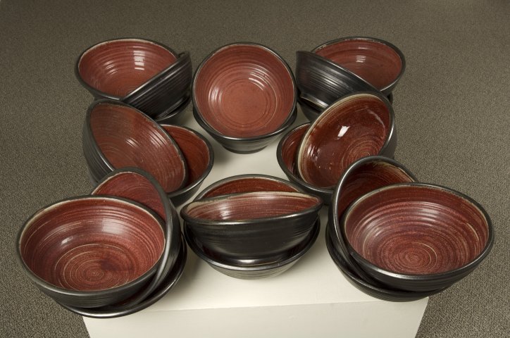 Thomas Edwards black bowls with red glaze